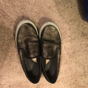 Sperry black and gold shoes